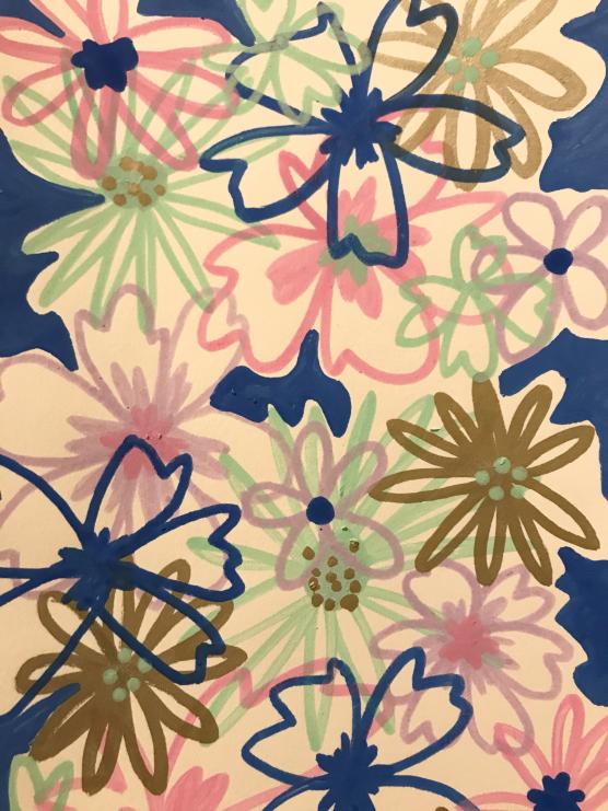 Collage of flowers made with paint markers on watercolor paper